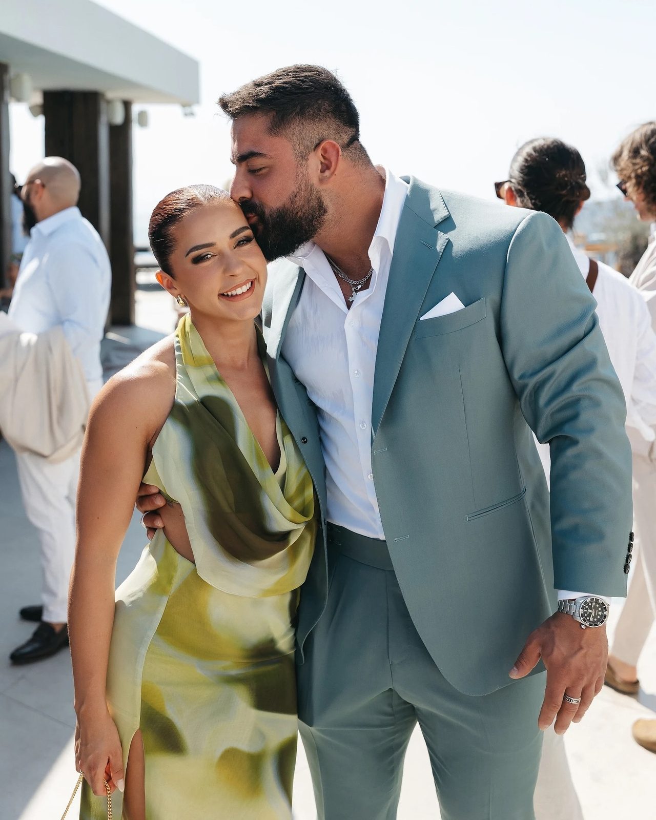 Cameron Whitters with his partner Ella at a wedding